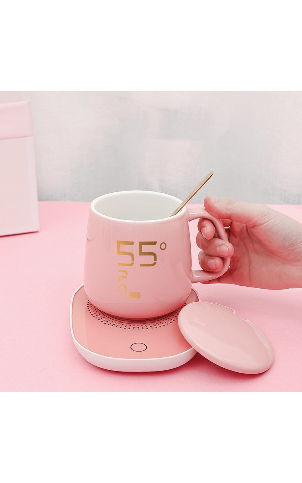 A practical pink gift set including a gift box, a mug with a smart electric water heater